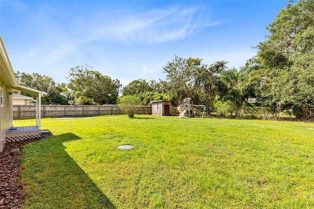 view of yard with a storage shed