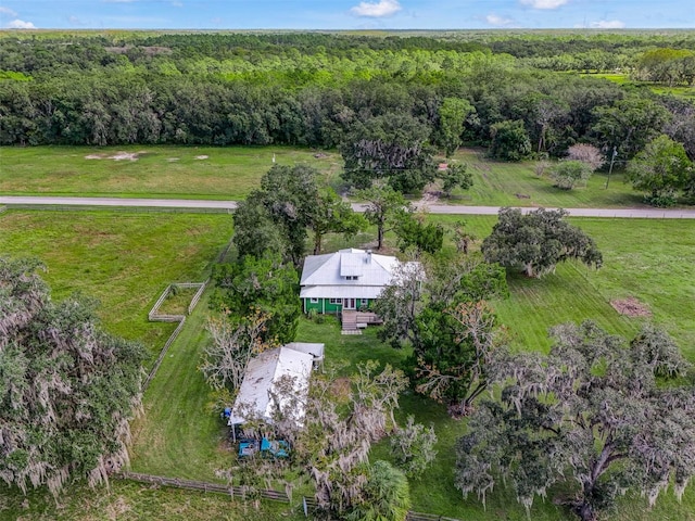 birds eye view of property with a rural view