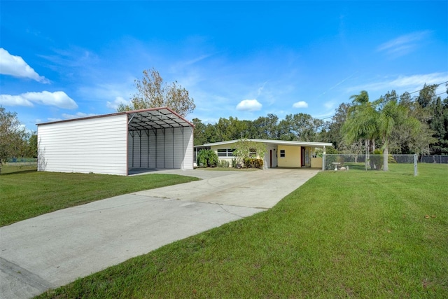 exterior space featuring a yard and a carport