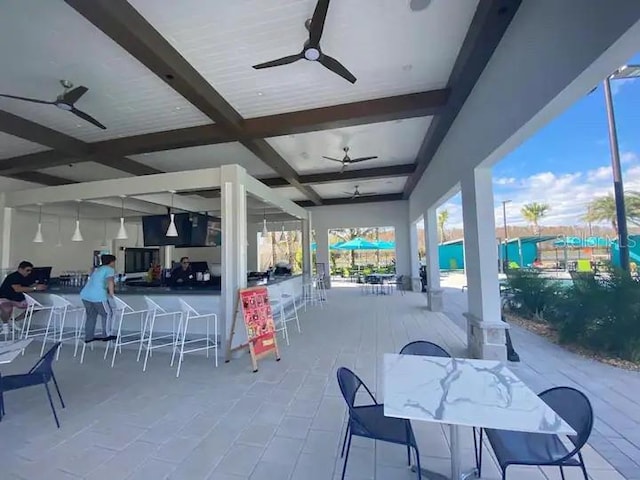 view of patio with ceiling fan