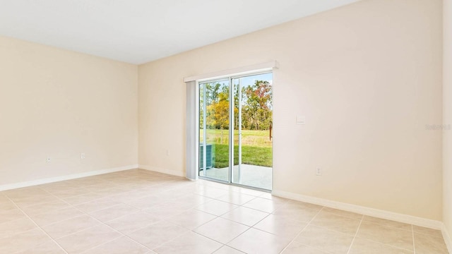 view of tiled spare room