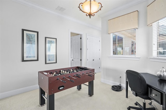 playroom featuring carpet floors and crown molding