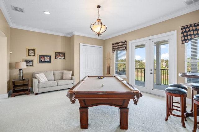 recreation room featuring french doors, plenty of natural light, light carpet, and crown molding