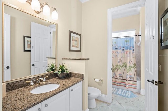 full bathroom featuring toilet, vanity, tile patterned flooring, and crown molding