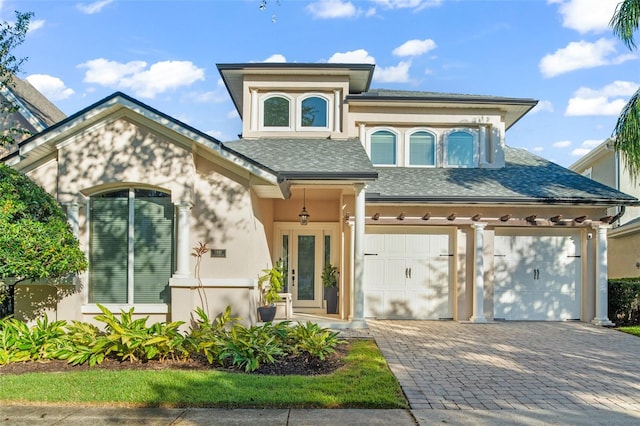 view of front of property featuring a garage