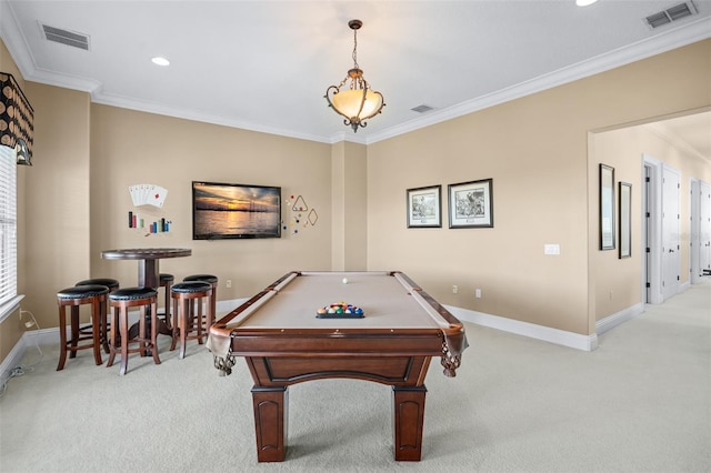 rec room with light colored carpet, ornamental molding, and billiards