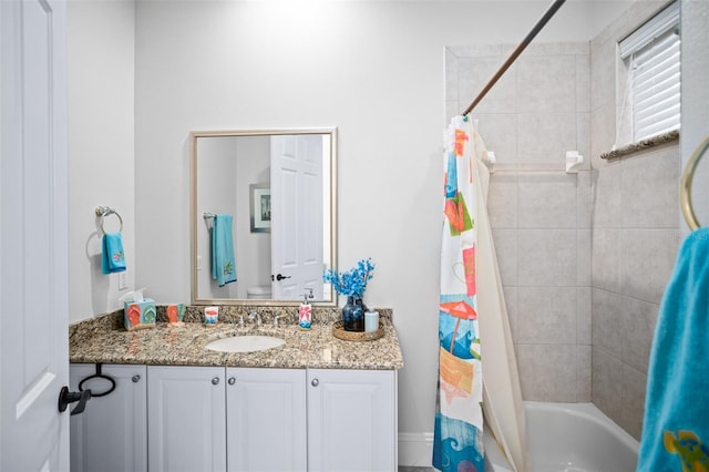 bathroom with vanity and shower / tub combo