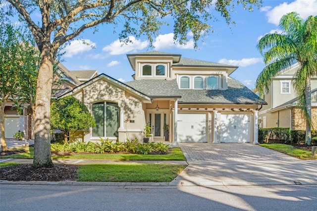 view of front of house with a garage