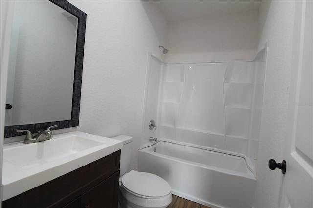 full bathroom with vanity, toilet, hardwood / wood-style flooring, and  shower combination