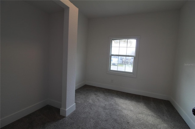 empty room with carpet flooring