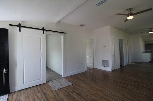 828 Willie Mays Pkwy, Orlando, FL 32811 - unfurnished living room with visible vents, a barn door, and ceiling fan