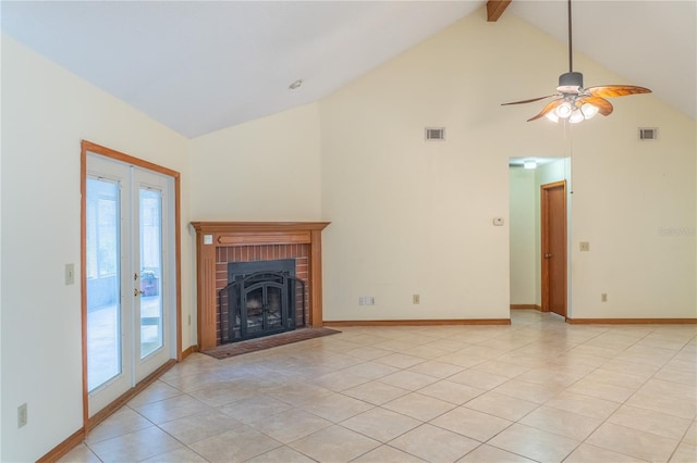 unfurnished living room featuring light tile patterned floors, ceiling fan, a wealth of natural light, a fireplace, and beam ceiling