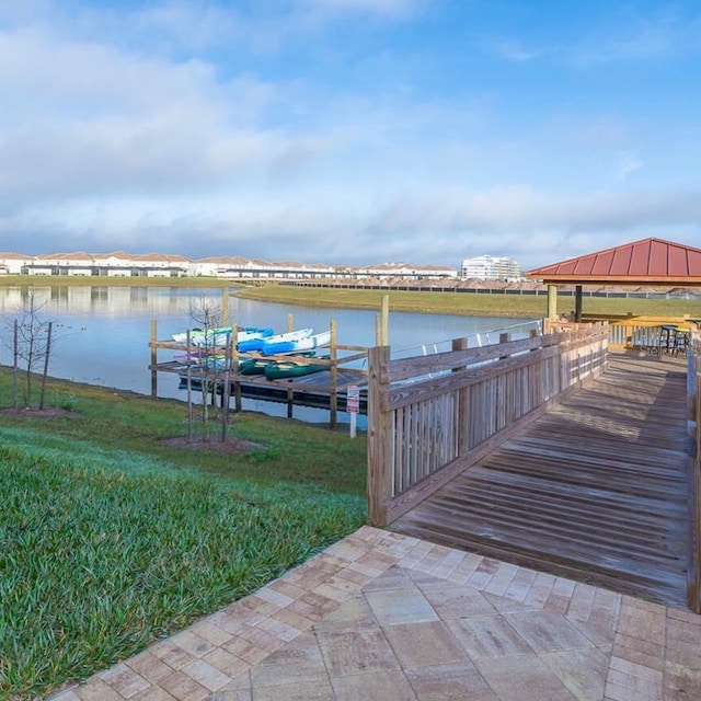 view of dock with a water view and a gazebo