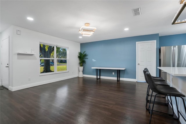 interior space with dark hardwood / wood-style flooring