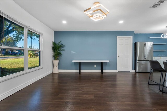 1213 Baranova Rd, Ocoee, FL 34761 - unfurnished dining area featuring recessed lighting, wood finished floors, baseboards, and a chandelier