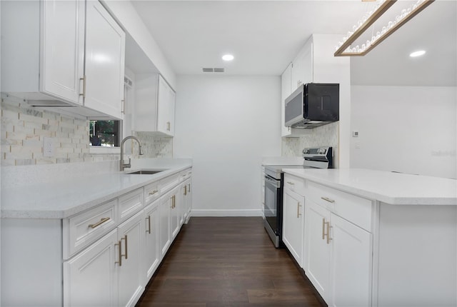 kitchen with stainless steel electric stove, decorative backsplash, white cabinets, dark hardwood / wood-style flooring, and sink