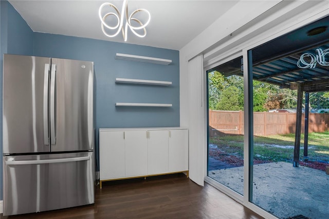 1213 Baranova Rd, Ocoee, FL 34761 - entryway with dark wood-type flooring and a chandelier