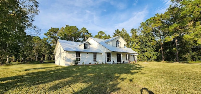 view of front of property with covered porch and a front lawn