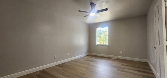 unfurnished bedroom featuring light wood-type flooring and ceiling fan