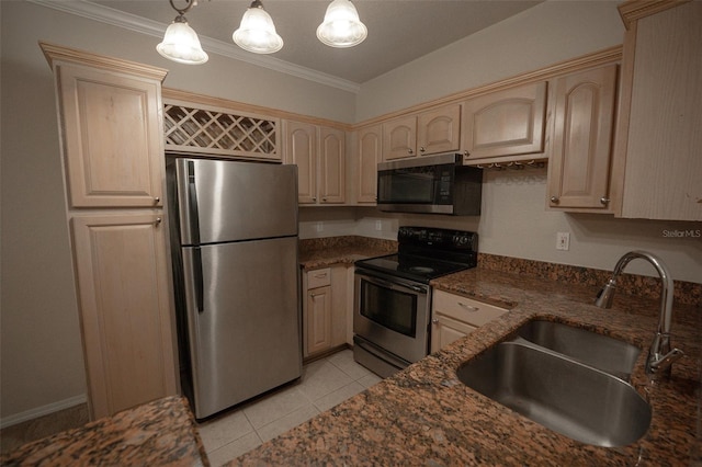 kitchen with pendant lighting, stainless steel appliances, ornamental molding, and sink