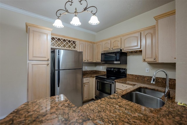 kitchen with stainless steel appliances, decorative light fixtures, sink, ornamental molding, and dark stone countertops