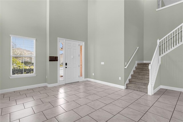 entryway with a high ceiling