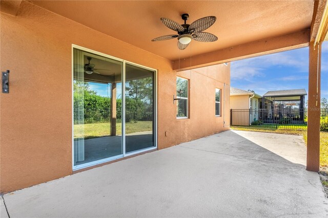 view of patio / terrace featuring ceiling fan