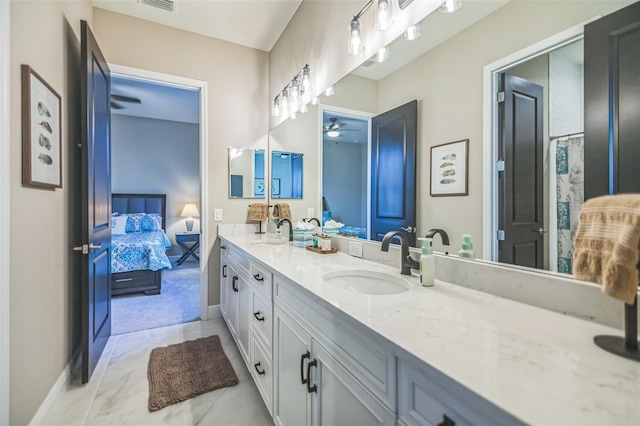 bathroom featuring vanity and ceiling fan