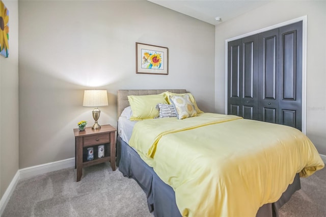 carpeted bedroom with a closet