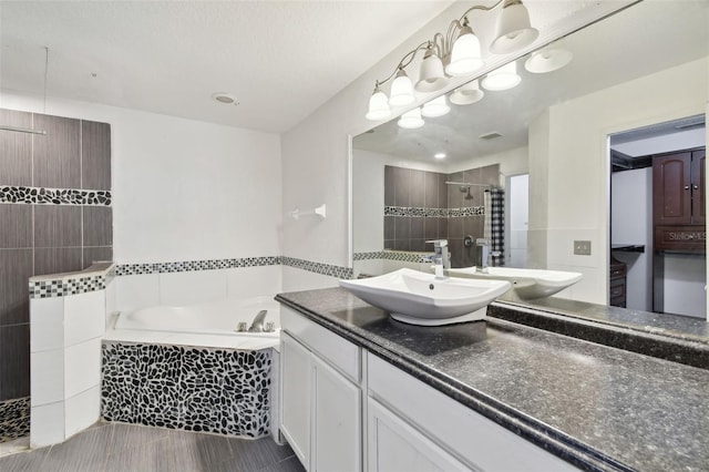 bathroom with vanity and plus walk in shower