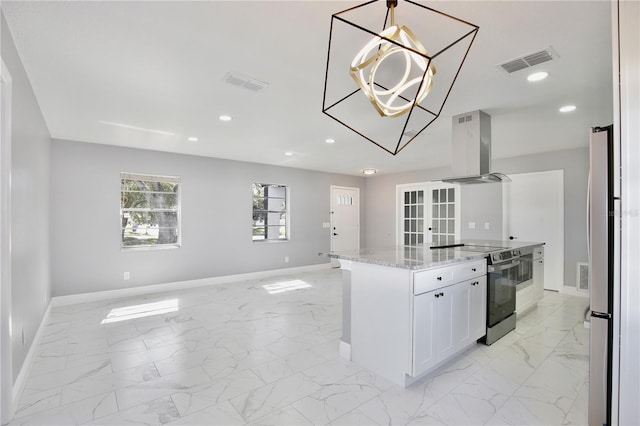 kitchen with island exhaust hood, stainless steel electric stove, light stone countertops, pendant lighting, and white cabinets