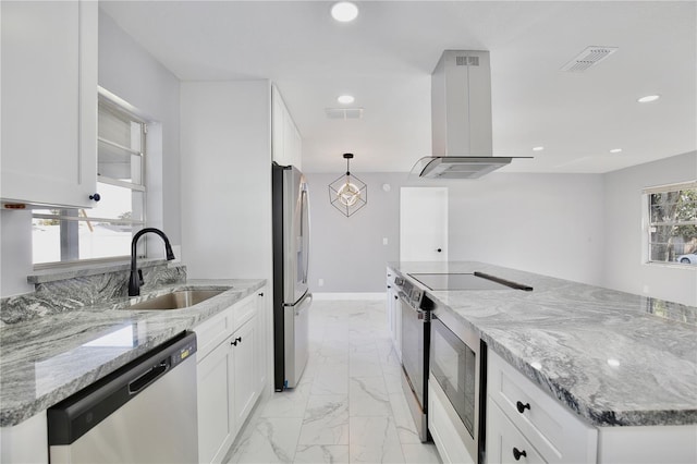 kitchen featuring extractor fan, light stone countertops, white cabinets, pendant lighting, and appliances with stainless steel finishes