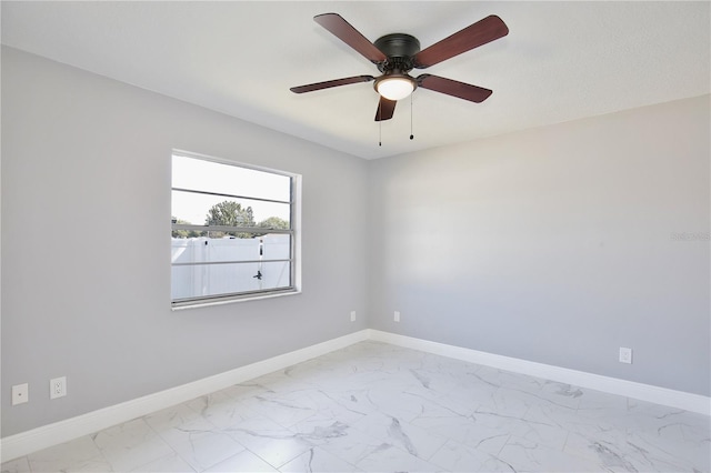 spare room featuring ceiling fan