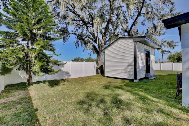 view of yard with a storage shed