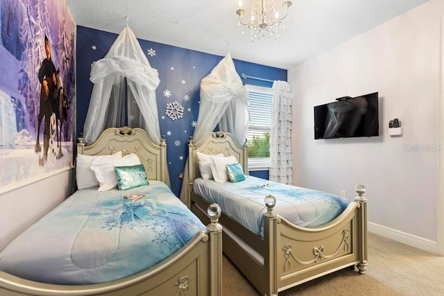 bedroom with carpet flooring and a chandelier