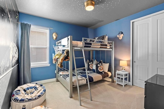 bedroom featuring carpet floors and a closet