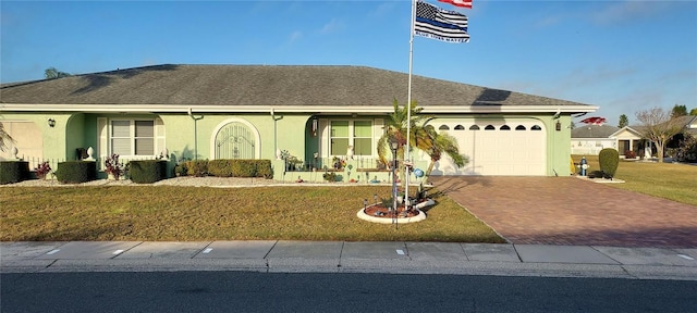 ranch-style house with a front lawn and a garage