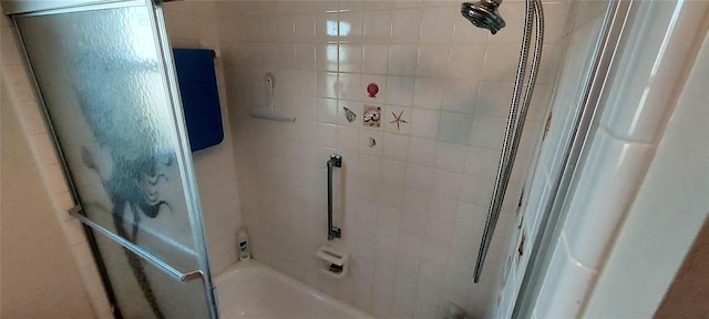 bathroom featuring tiled shower / bath combo