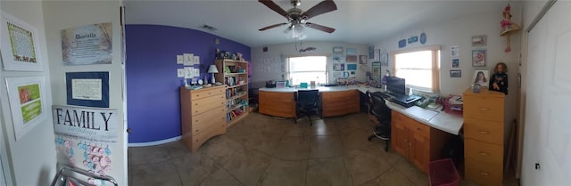 906 Bluewater Dr, Sun City Center, FL 33573 - office with a ceiling fan, vaulted ceiling, and light tile patterned flooring