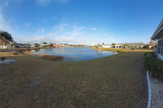 906 Bluewater Dr, Sun City Center, FL 33573 - water view featuring nearby suburban area