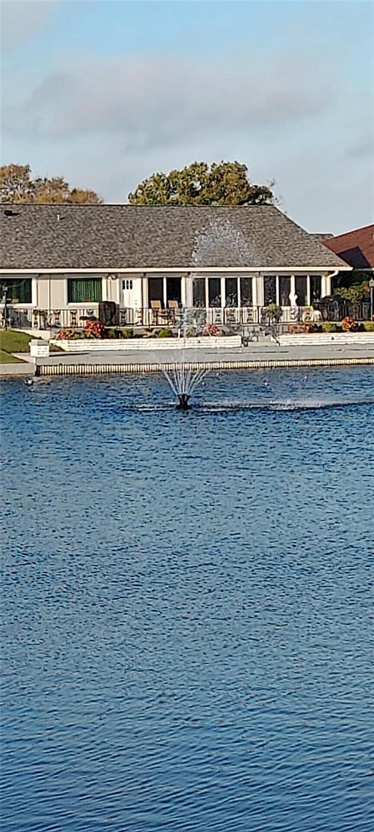 906 Bluewater Dr, Sun City Center, FL 33573 - view of pool with a water view
