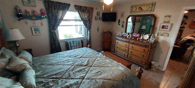 906 Bluewater Dr, Sun City Center, FL 33573 - bedroom with light tile patterned floors