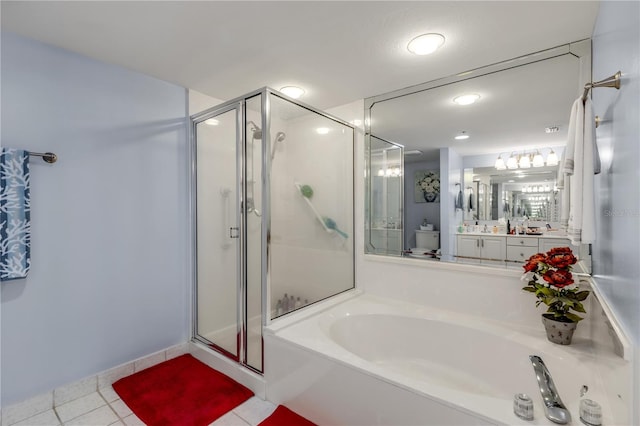 bathroom with vanity, tile patterned floors, and separate shower and tub