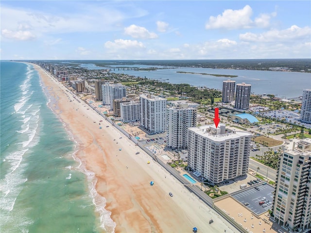 aerial view featuring a water view and a view of the beach