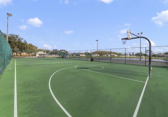 2688 Hawthorne Ln, Kissimmee, FL 34743 - view of basketball court with community basketball court and fence