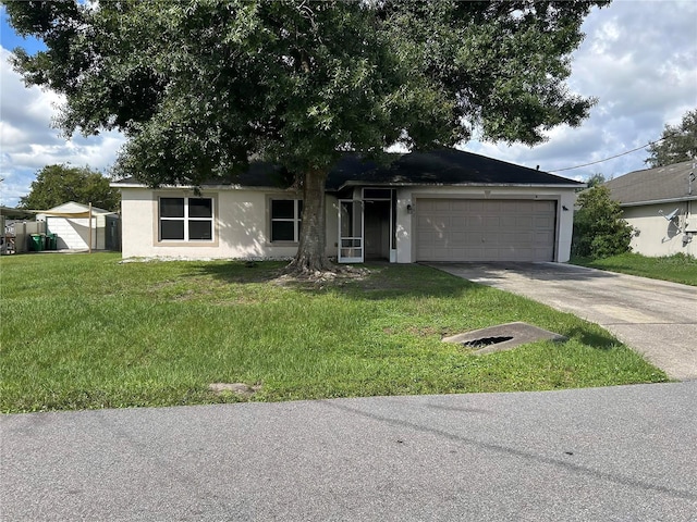 single story home with a front yard and a garage