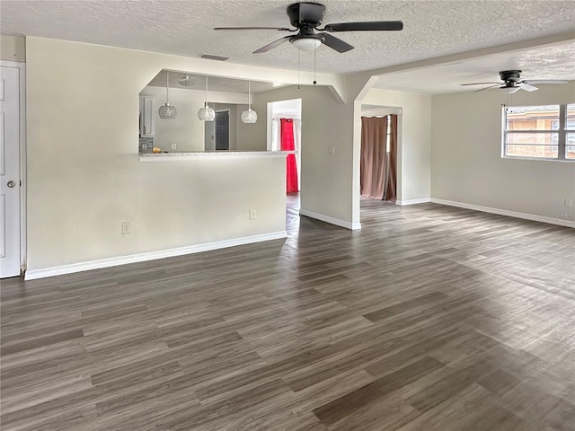 1904 Historic Goldsboro Blvd, Sanford, FL 32771 - unfurnished living room with baseboards, dark wood-style flooring, and ceiling fan