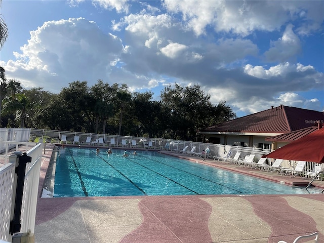 community pool with fence