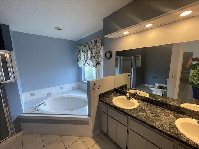 full bath featuring tile patterned flooring, a sink, and double vanity