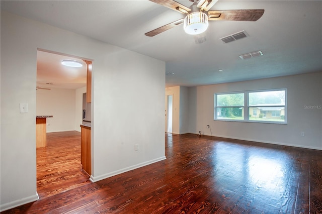 unfurnished room with wood-type flooring and ceiling fan